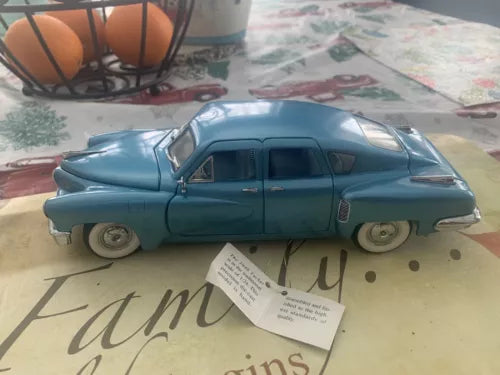 Franklin Mint 1948 Tucker Torpedo Waltz blue 1:24 diecast car with paper tag