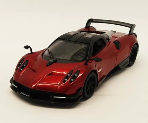 Red diecast metal model car with black wheels and rear wing