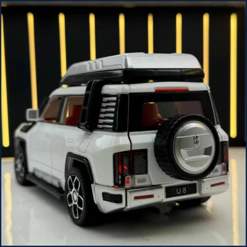 Diecast SUV model with light detailing, rear three-quarter view, white and black