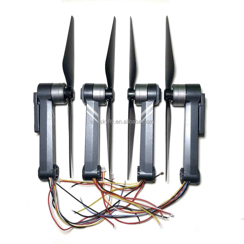 RC quadcopter motor arms with propellers and wiring harness