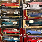 Blister-pack 1:18 scale diecast Chevrolet cars, assorted colors