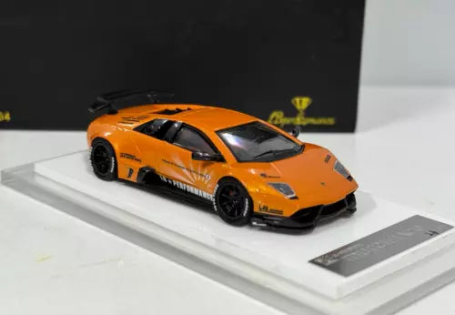 1:64 orange Lamborghini diecast sports car model with black wheels