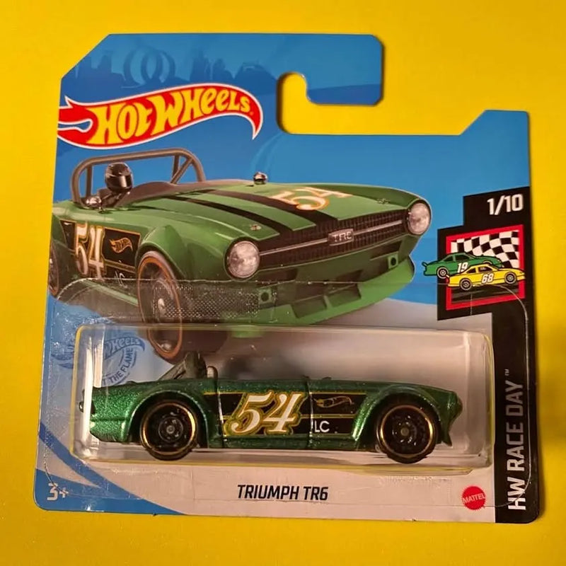 Green Triumph TR6 1/10 diecast race car on Hot Wheels short card, HW Race Day