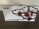 Ei Hi alien bug drone 8-axis quadcopter in retail box, red and black.