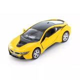 Yellow diecast sports car model, front view with black hood vents