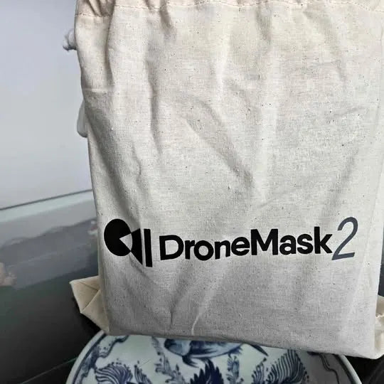 Beige fabric pouch with DroneMask2 logo