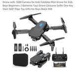 Foldable mini drone with dual cameras and remote controller, plus accessory parts