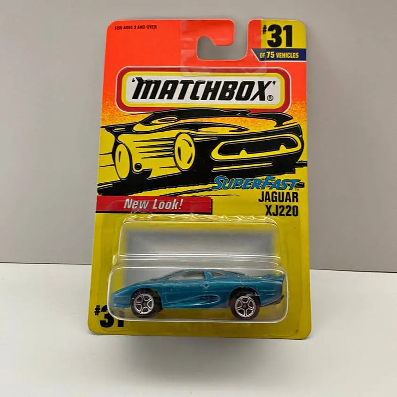 Matchbox diecast car in blue Jaguar XJ220 on blister card, Superfast graphics