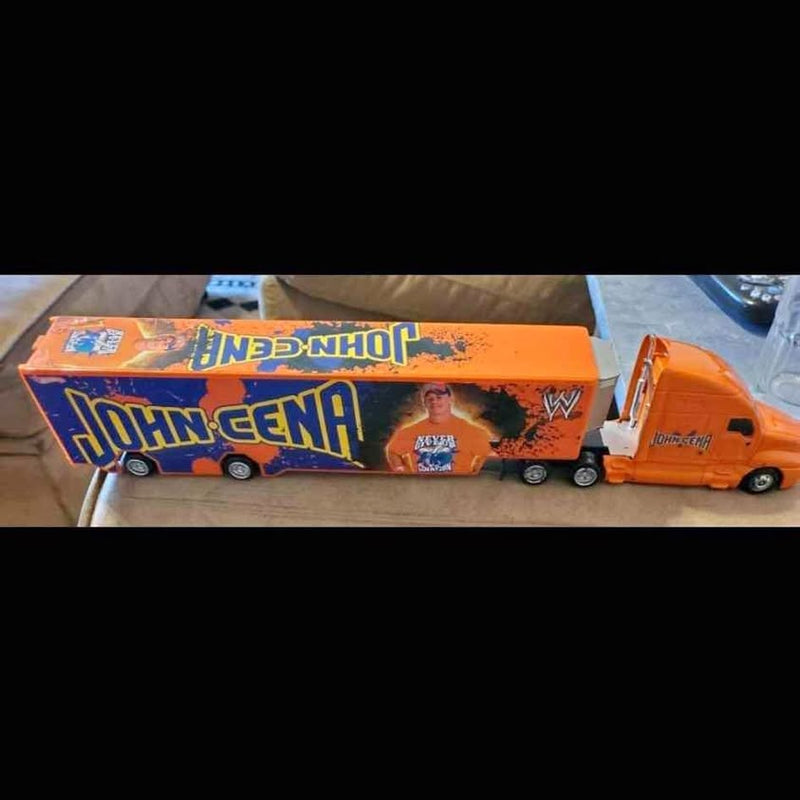 WWE John Cena semi truck diecast with orange trailer and cab