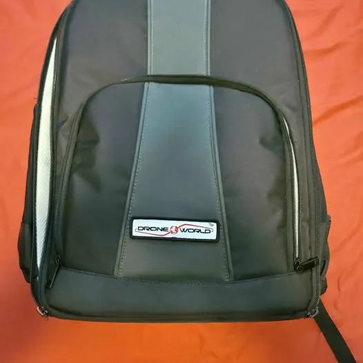 Dark green drone backpack with front zipper and DRONE X WORLD patch