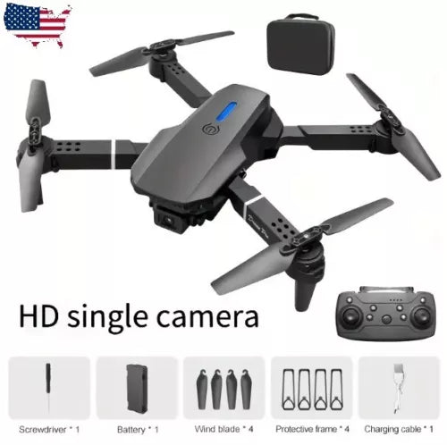 Gray foldable quadcopter drone with four propellers, remote controller, and carrying case