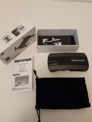Black foldable mini RC selfie drone with Tracker label and accessories in box