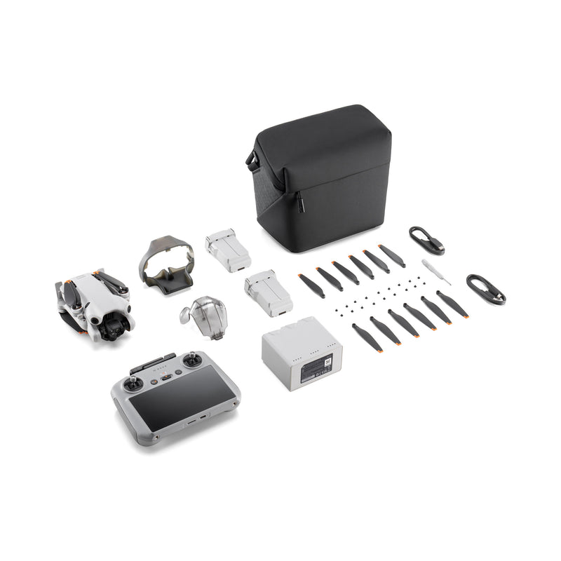 Foldable quadcopter drone kit with controller, spare batteries, propellers, carrying case