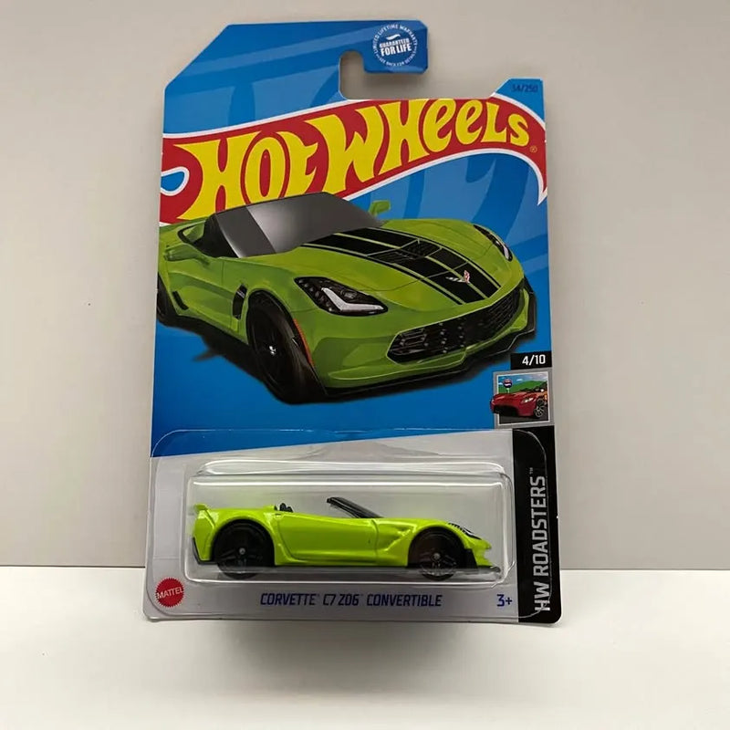 Green Hot Wheels diecast convertible car in blister pack, front view