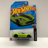 Green Hot Wheels diecast convertible car in blister pack, front view