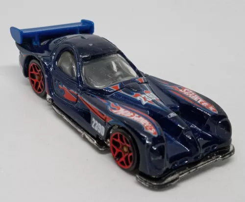 Dark blue diecast race car, red wheels, multicolor decals, 1:64 scale
