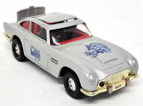 Silver diecast model car with 007 front and side decals, front-left view