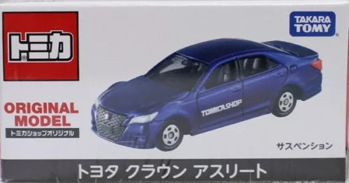 Dark blue Takara Tomy diecast toy sedan with detailed grille and side logo