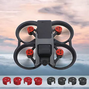 Aluminum drone motor cover with screws, black frame and red motor mounts
