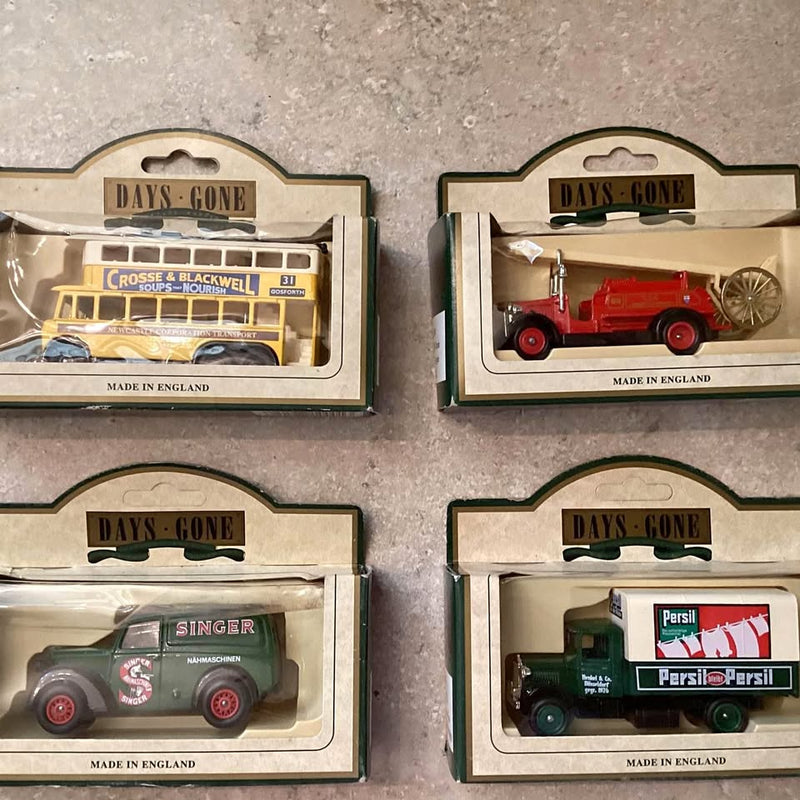 Set of 4 Days Gone diecast cars in boxes: yellow bus, red van, gray mower, green truck