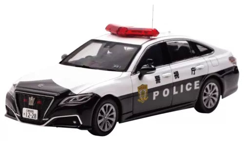 Diecast police car model with white and dark body, front three-quarter view
