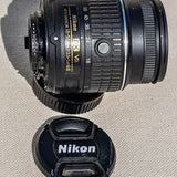 Nikon AF-S 18-55mm GII VR DX zoom lens with front cap