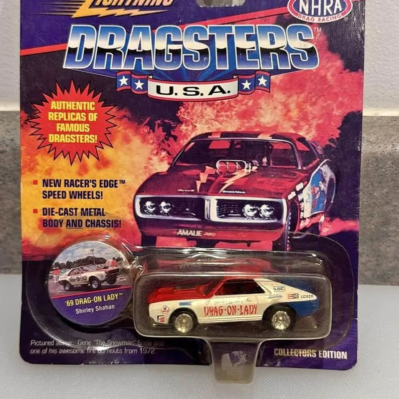 Diecast dragster model in blister pack, front view with white, blue, red details