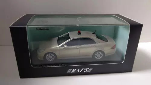 White 1/64 Toyota Crown diecast sedan in display box