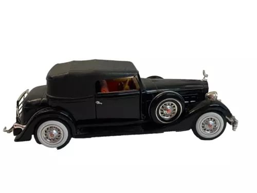 1:27 scale black diecast convertible car with red interior upholstery
