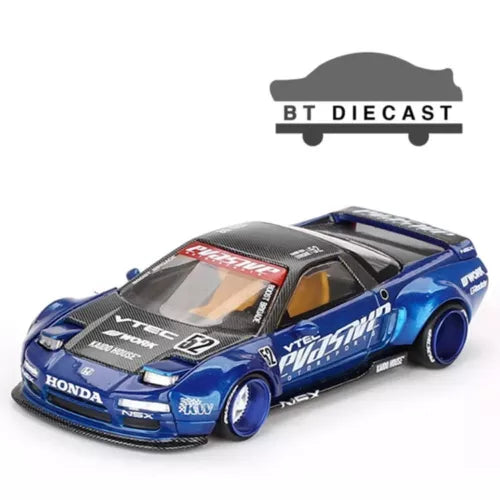Blue diecast sports car model with rear wing and racing livery, 1/64 scale.