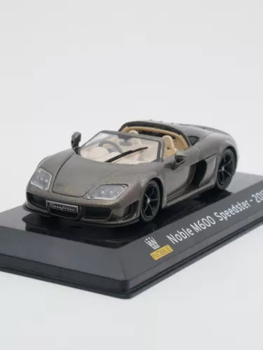 Gray 1:43 diecast speedster car model with open cockpit on display base