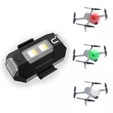 Drone strobe LED lamp with black housing, red/green/white light indicators and drone mount