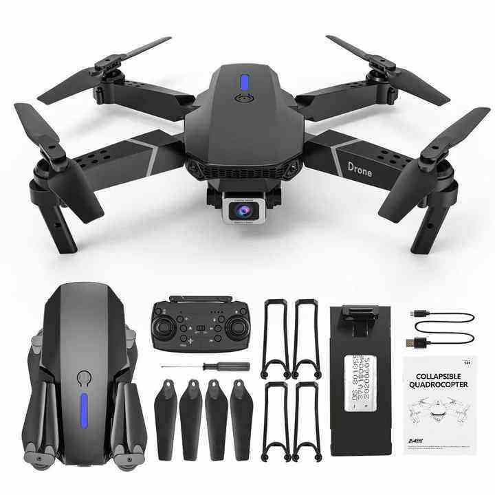 Foldable RC drone with dual cameras, remote controller, and spare propellers