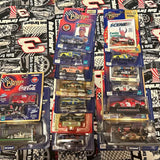 1:64 diecast car multipack with blister display of multiple race cars