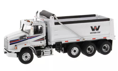 White diecast Western Star dump truck model with raised cab and dump bed, 1/50 scale