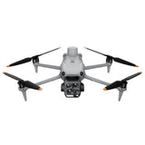 Gray quadcopter drone with four foldable propellers and front camera gimbal