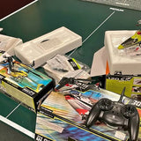 Drone model bundle with remote controller and boxed parts