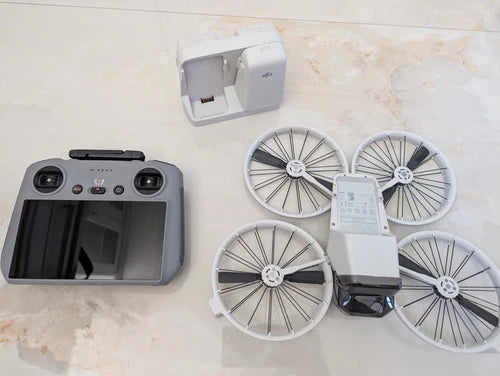 DJI Flip Fly More camera drone kit with controller, 4 propellers and charging case