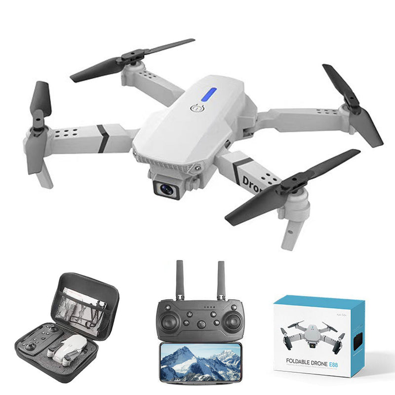 Folding quadcopter drone with camera, remote controller, monitor, and retail box