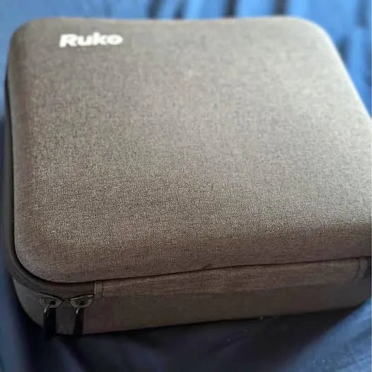 Ruko drone hard carrying case, gray fabric exterior with zipper pull