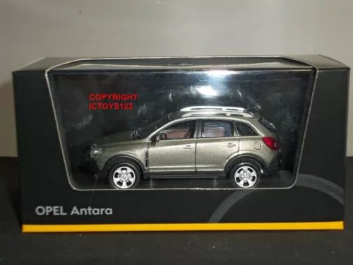 Grey diecast SUV model car in box display, front three-quarter view
