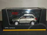 Grey diecast SUV model car in box display, front three-quarter view