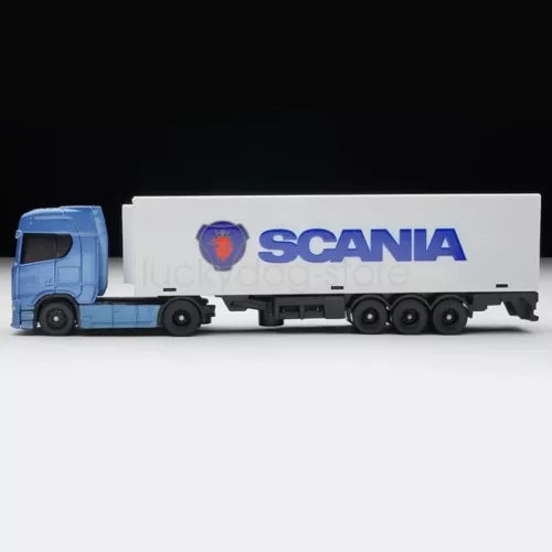 Diecast freight truck model with blue cab and white trailer, SCANIA logo