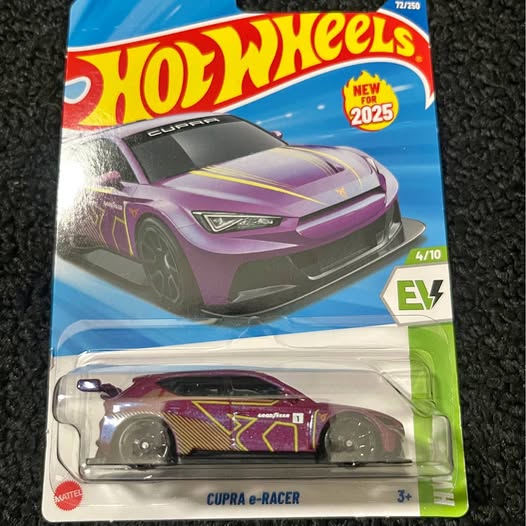 Hot Wheels diecast EV racer car in blister pack, purple and yellow graphics.