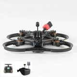Mini cinewhoop FPV drone with black frame, four prop arms, red connector, top antenna