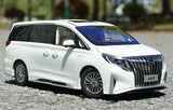 White diecast minivan model with chrome grille, front three-quarter view