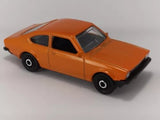 Orange 1975 Opel Kadett two-door diecast model car, 1/64 scale