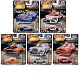 Set of four Hot Wheels 1/64 diecast cars in blister packs