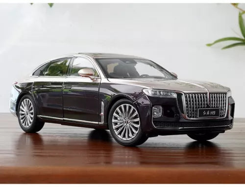 Purple diecast sedan model car, chrome grille and front headlight detail