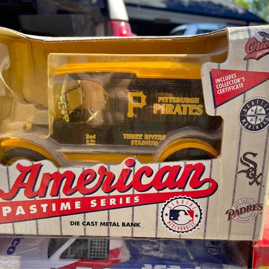 Yellow die-cast vehicle bank in retail box with Pittsburgh Pirates logo and bank branding